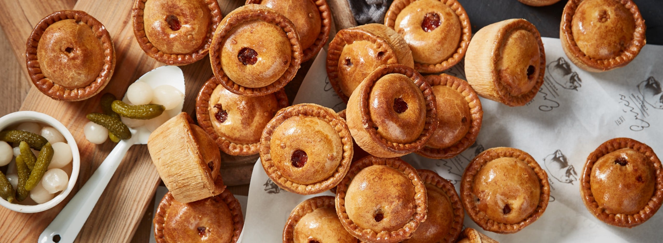 Eric's food photography showcasing a group pie product as part of a rebranding effort.