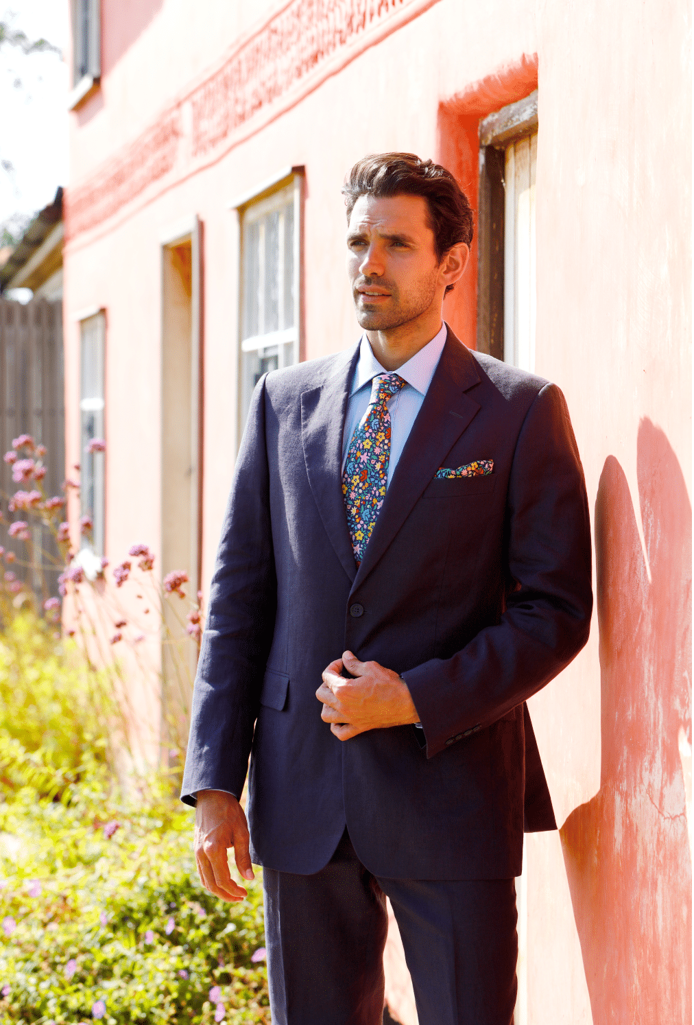 Fashion photography catalogue design for Joseph Turner, capturing the timeless style and elegance of a man standing in a suit.