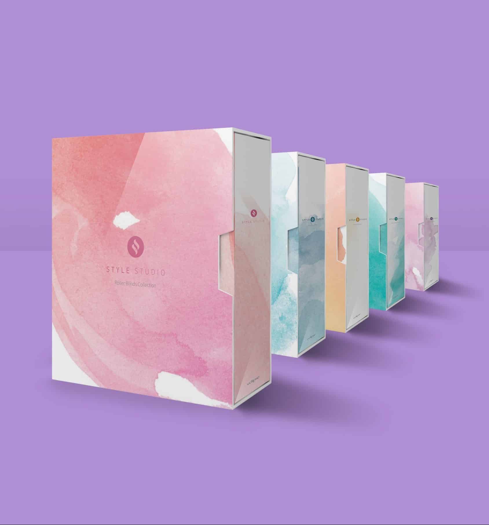 Eclipse Style Studio branding materials, including books and brochures with sleek design.
